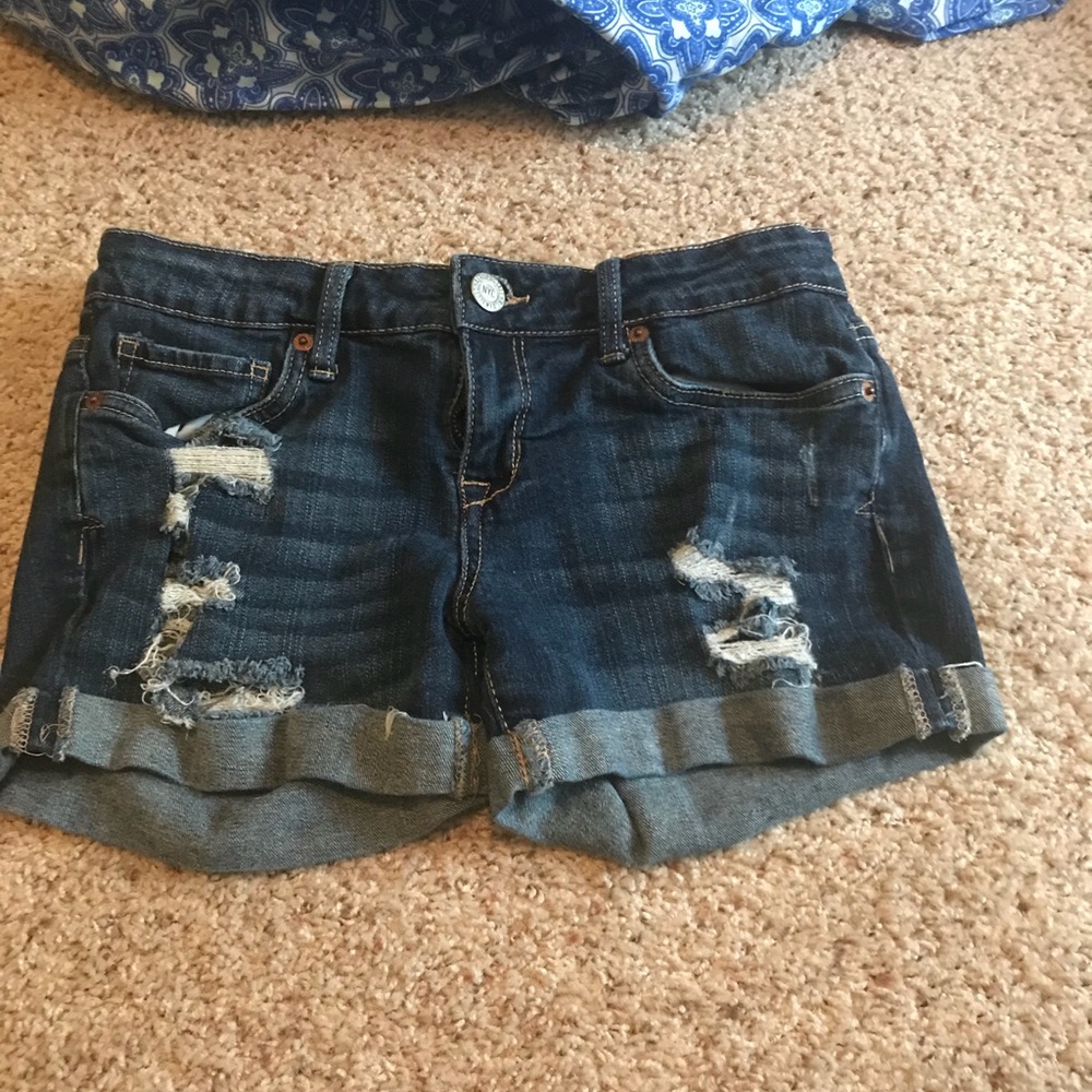 Short ripped jean shorts